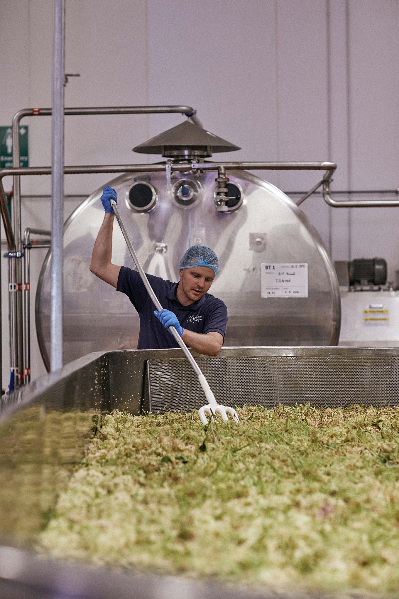 belvoir farm elderflowers being hand stirred before being made into our iconic elderflower drinks